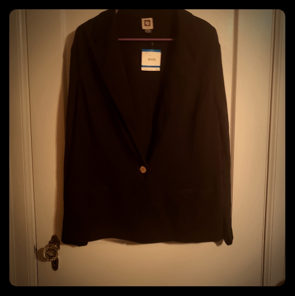 Black blazer and black slacks